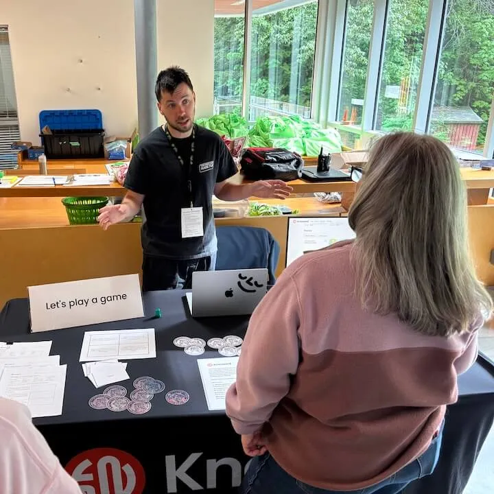 Trevor talking to teachers at the Knoword booth