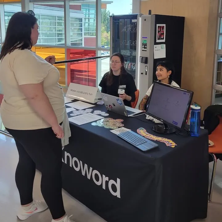 Knoword reps talking to a teacher